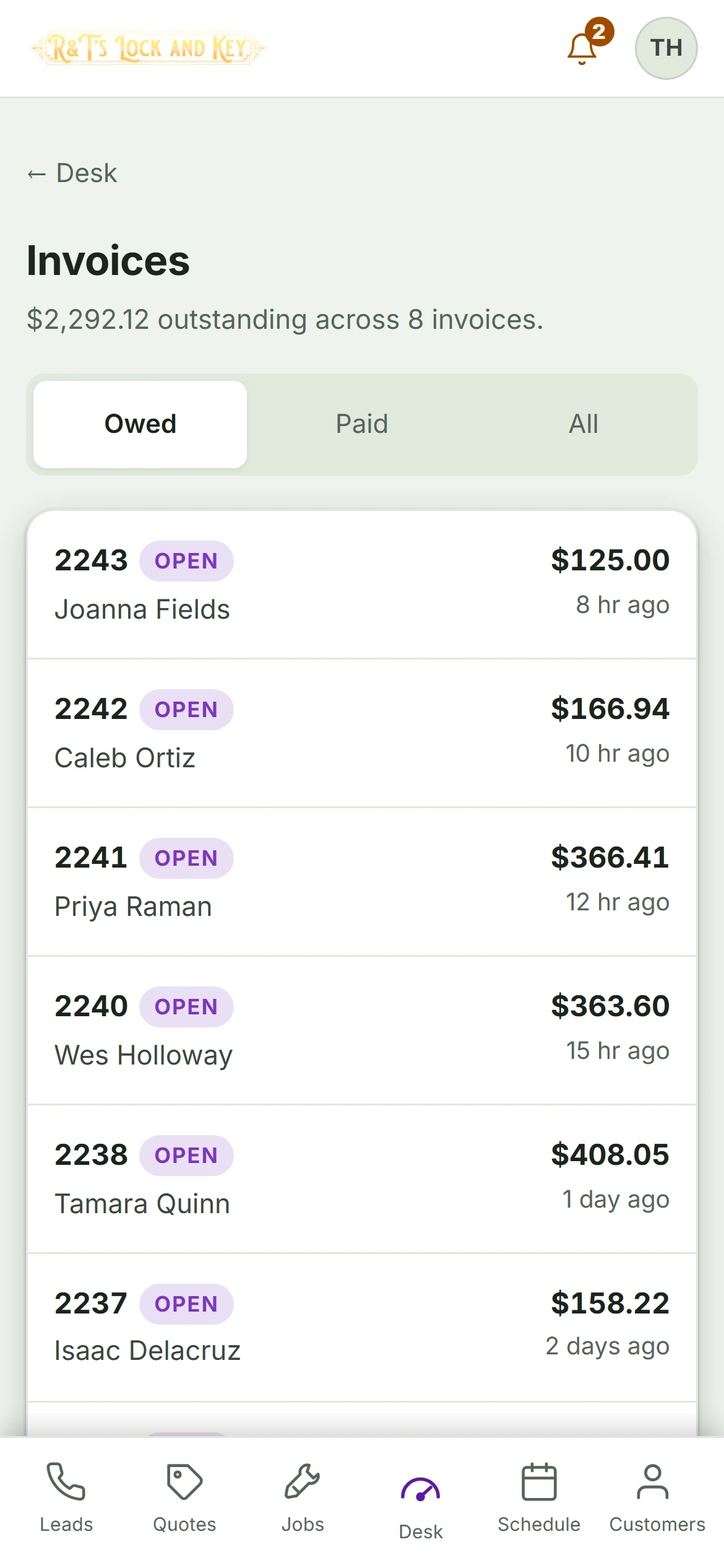 R&T's Lock and Key, locksmith, on a phone. What is owed, on one screen.
